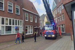 Dakbrand blijken rokende worsten (Zaandam)