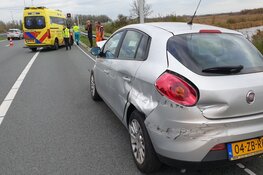 Auto in de slip op Knooppunt Zaandam