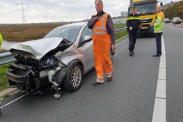 Auto in de slip op Knooppunt Zaandam